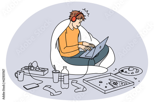 Guy gamer playing online on laptop surrounded by food at home. Desperate man using computer feel addicted to social media and gaming. Addiction to gadgets. Vector illustration.