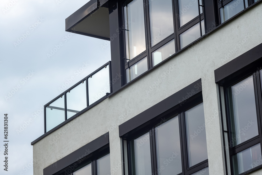 detail view of the facade of a modern office building detail view of the facade of a modern office building