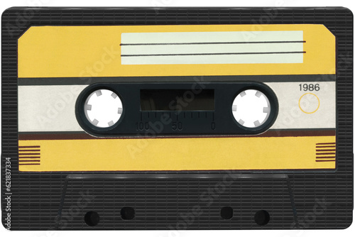 Black audio cassette, compact cassette, cassette tape with a yellow label. High resolution isolated on a transparent background