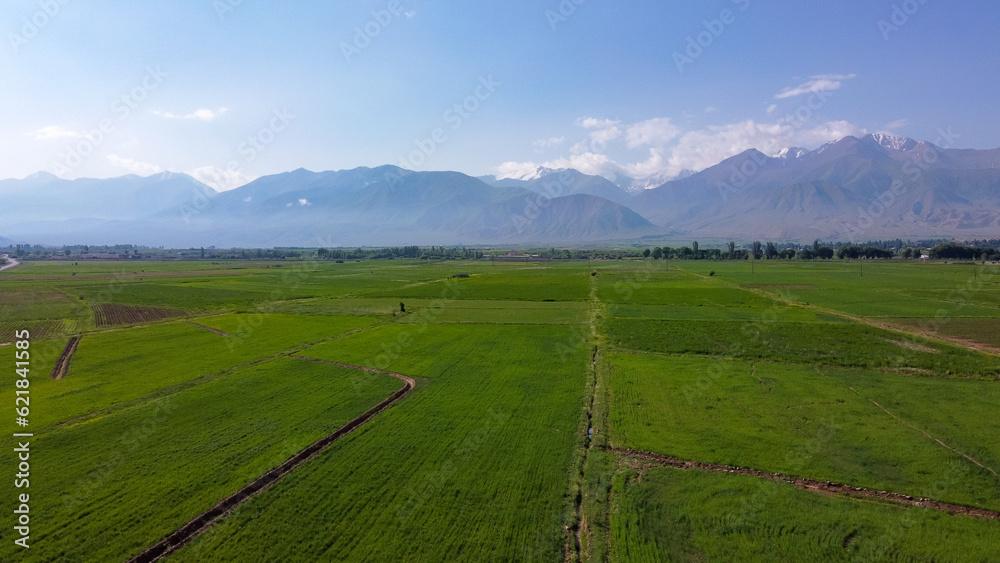 View of the mountains and the clearing in Kyrgyzstan, Kochkor, view from the top, aerial View of the mountains and the clearing in Kyrgyzstan, Kochkor, view from the top, aerial
