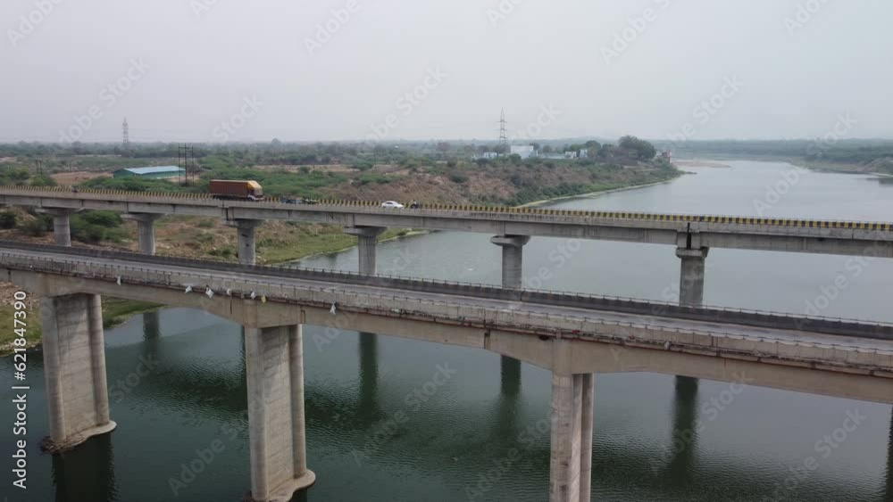 Highway bridge built over the river basin in the Indian rural terrain Highway bridge built over the river basin in the Indian rural terrain