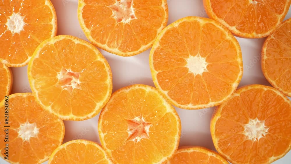 A group of oranges slices, meticulously cut in half, reveal intricate patterns and vibrant hues. Captured with a probe lens, every juicy detail is magnified. Fruit concept. Orange background. 4K HDR
A group of oranges slices, meticulously cut in half, reveal intricate patterns and vibrant hues. Captured with a probe lens, every juicy detail is magnified. Fruit concept. Orange background. 4K HDR