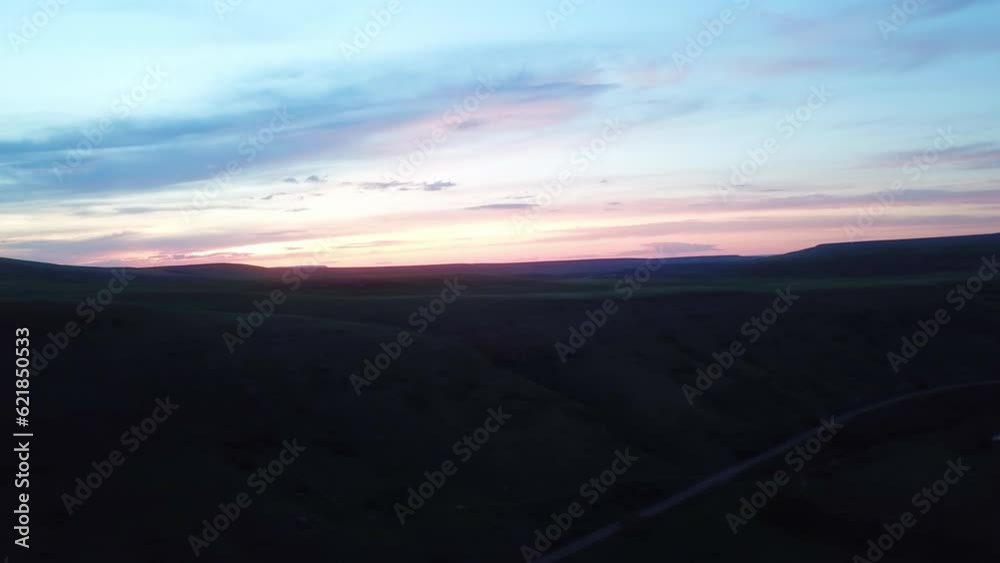 Aerial Shot Of Scenic Mountains Against Sky During Sunset, Drone Panning Over Landscape - Billings, Montana Aerial Shot Of Scenic Mountains Against Sky During Sunset, Drone Panning Over Landscape - Billings, Montana