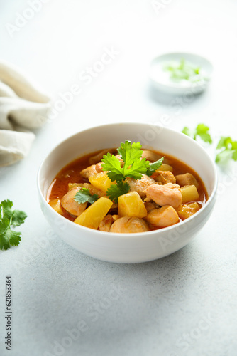 Chicken ragout with pineapple and spices