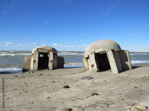 2 abandoned concrete pillbox bunkers on the Albanian coast