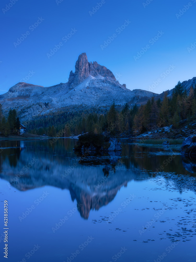 Lago Federa, Dolomite Alps, Italy. High mountains and reflection on the surface of the lake. A place to vacation and travel. Landscape at the night.