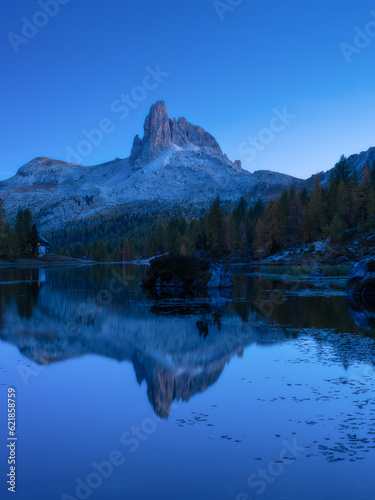 Lago Federa, Dolomite Alps, Italy. High mountains and reflection on the surface of the lake. A place to vacation and travel. Landscape at the night.