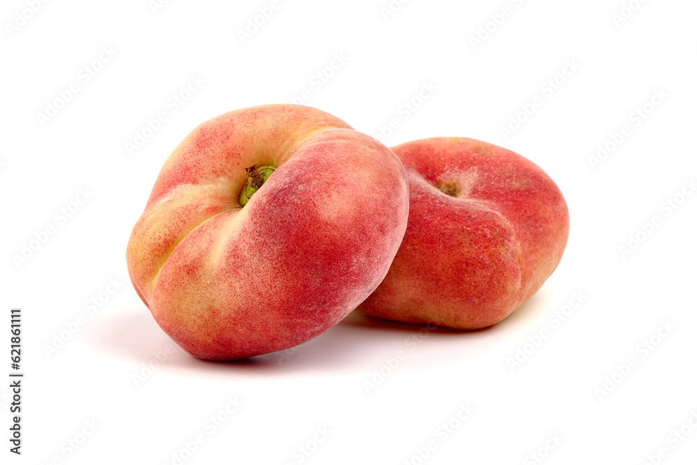 Flat Peaches, ripe nectarines, isolated on white background.