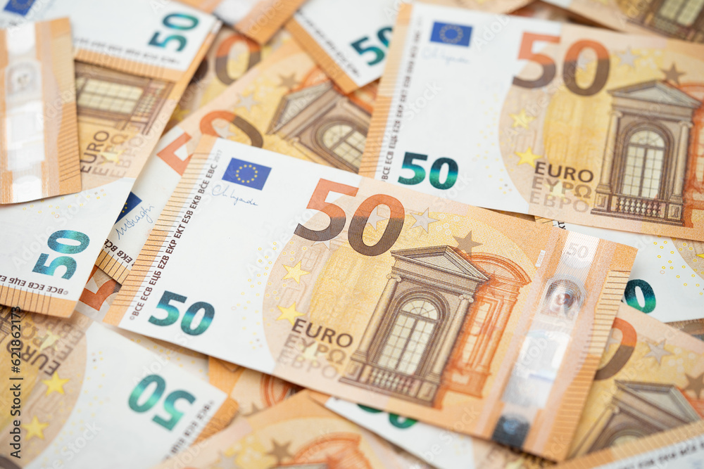many 50 euro bills close-up mixed haphazardly many 50 euro bills close-up mixed haphazardly