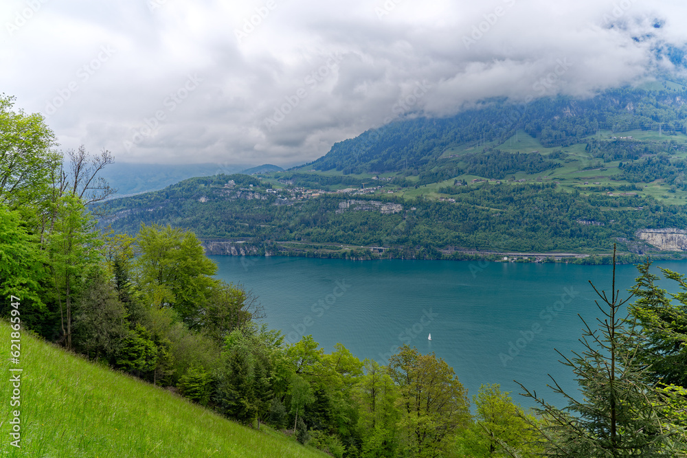 Aerial view of scenic landscape with Lake Lucerne and Swiss mountain panorama in the background on a cloudy spring day. Photo taken May 18th, 2023, Seelisberg, Switzerland.