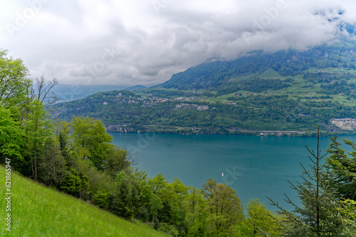 Aerial view of scenic landscape with Lake Lucerne and Swiss mountain panorama in the background on a cloudy spring day. Photo taken May 18th  2023  Seelisberg  Switzerland.