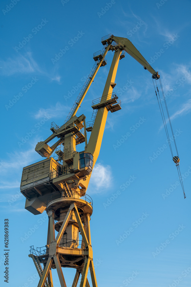 Shipyard crane against blue sky Shipyard crane against blue sky
