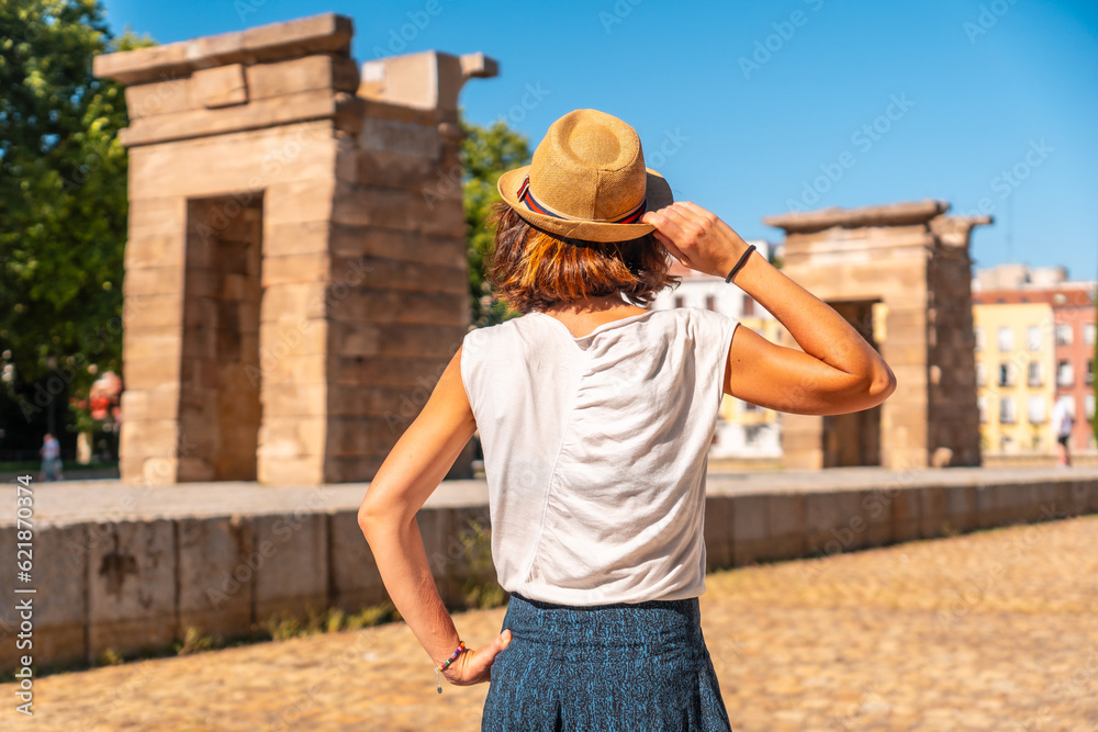 Temple of Debod in the city of Madrid of Egypt, tourist woman with hat in the ancient Egyptian temple