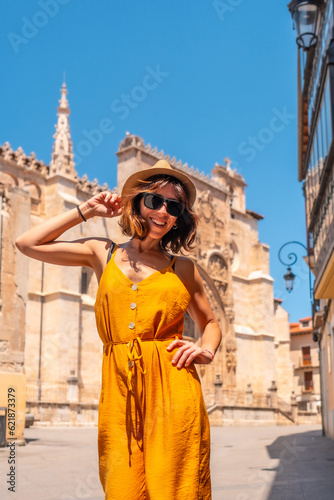 Woman having fun in the church of Santa María la Real in Aranda de Duero in the province of Burgos. Spain