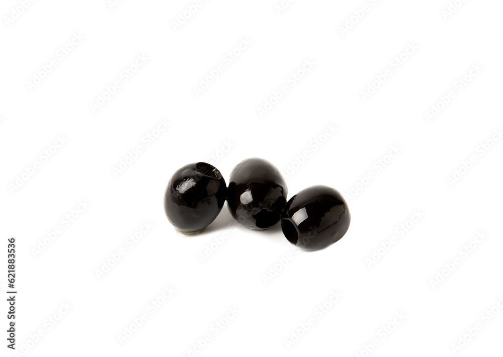 Tasty black olives isolated on white background. Olive and olive tree branches on a white table. Delicacy. Tasty black olives isolated on white background. Olive and olive tree branches on a white table. Delicacy.