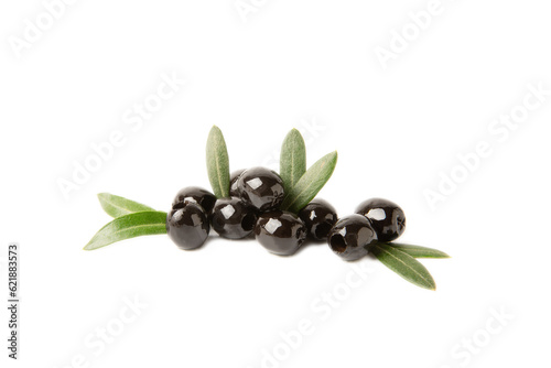 Tasty black olives isolated on white background. Olive and olive tree branches on a white table. Delicacy.