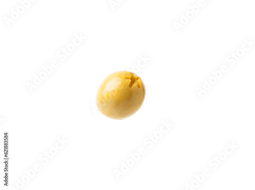 Delicious green olives isolated on white background. Olive and olive tree branches on a white table. Delicacy.