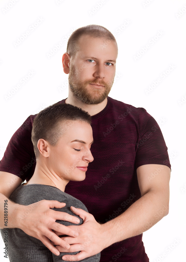 Portrait of attractive cute cheerful couple cuddling, isolated over white background Portrait of attractive cute cheerful couple cuddling, isolated over white background