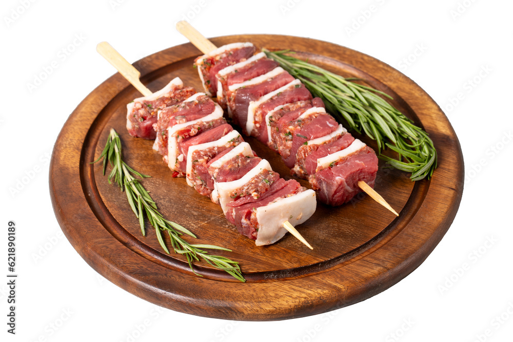 Beef skewer. Shish kebab prepared with raw ribeye and minced meat isolated on white background