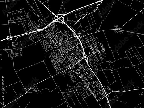 Vector road map of the city of  Heerenveen in the Netherlands with white roads on a black background.