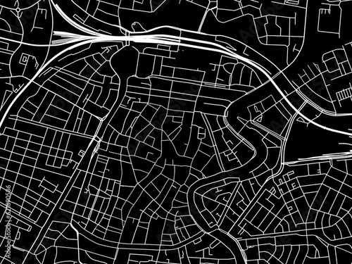 Vector road map of the city of  Haarlem Centrum in the Netherlands with white roads on a black background.
