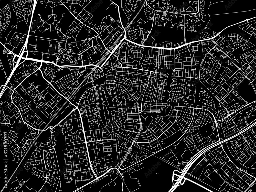 Vector road map of the city of  Leiden in the Netherlands with white roads on a black background.