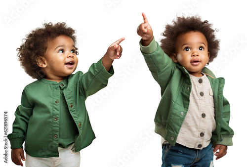 Set of stylish, fashionable, happy, cute Afro-American child toddler in different poses - pointing finger up, showing something