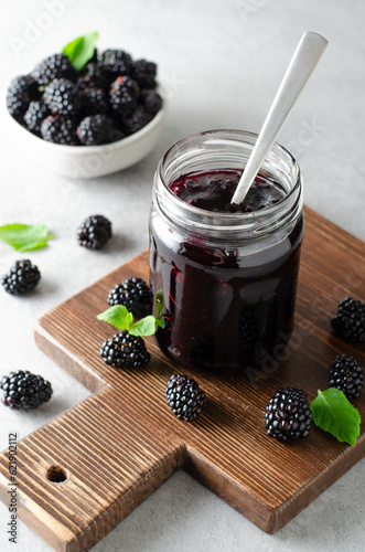 Blackberry Jam in a Jar, Delicious Homemade Berry Jam on Bright Background