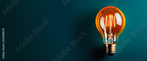 Glowing Incandescent Light Bulb On A Matte Blue Background Created With The Help Of Artificial Intelligence