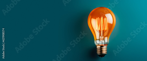 Glowing Incandescent Light Bulb On A Matte Blue Background Created With The Help Of Artificial Intelligence