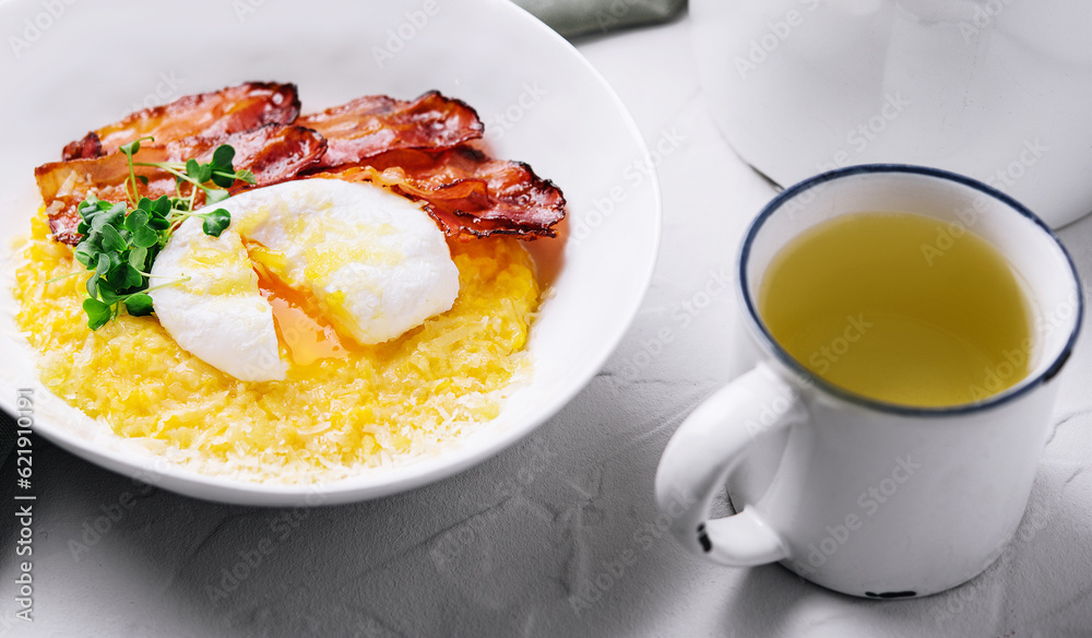 Fried bacon pieces and poached eggs on a plate Fried bacon pieces and poached eggs on a plate