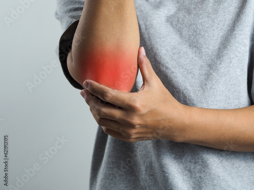 man hurts elbow arm joint pain who suffer from the wrong exercise incorrect lifting