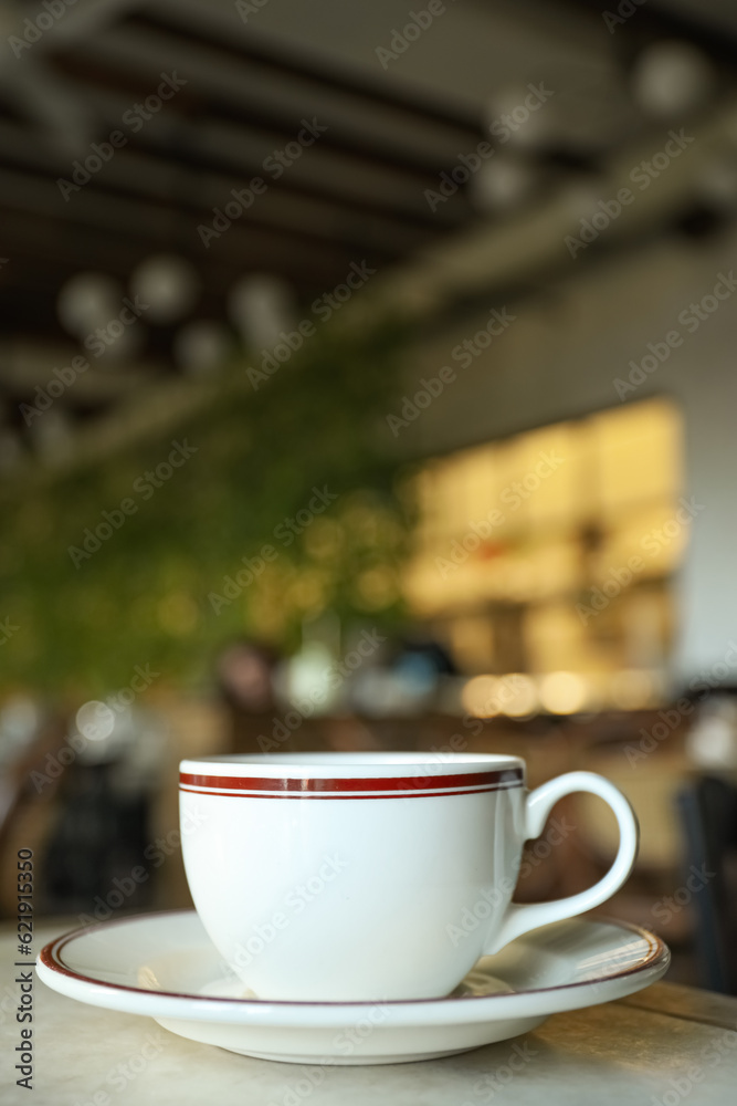 A cup of coffee on a table in a cafe