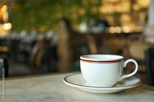 A cup of coffee on a table in a cafe