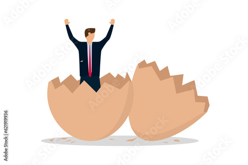 A new business is being launched by a newbie. An ambitious businessman worker has just emerged from a shattered egg.