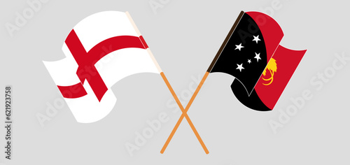 Crossed and waving flags of England and Papua New Guinea
