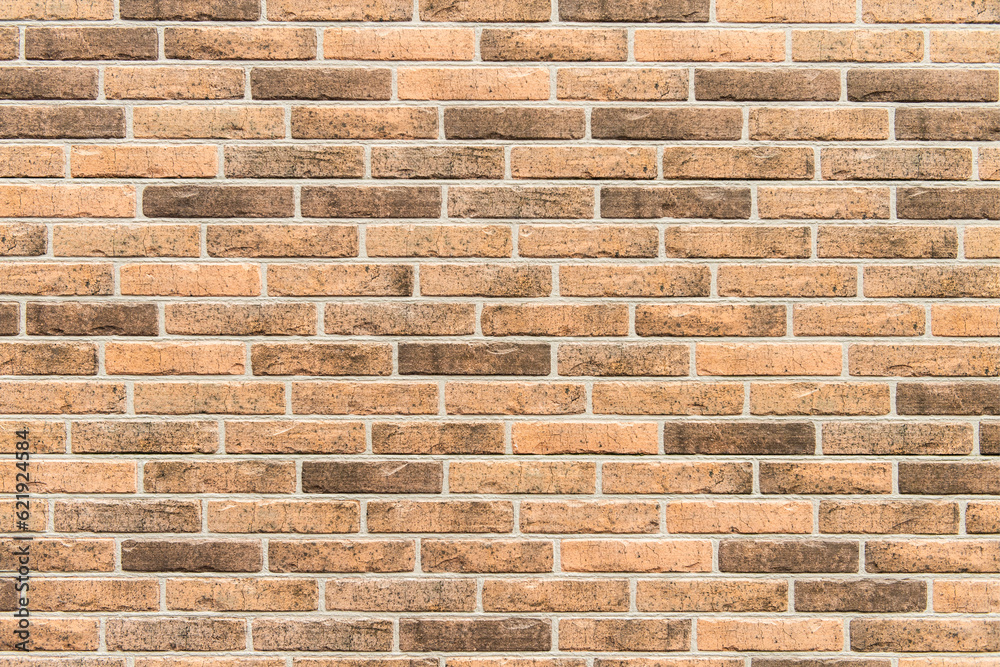 Obraz premium 煉瓦調のタイルの壁面