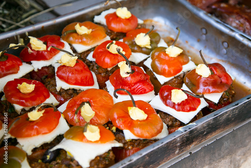 The stuffed rocoto is a Peruvian dish of Arequipa origin, stuffed with beef tenderloin, peanuts, chopped onion, raisins and cheese, as well as being seasoned with spices  photo