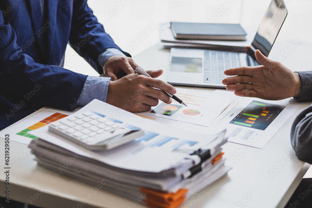 Business documents, Business people consulting meeting to discuss financial report analysis and business strategy planning. Business documents, Business people consulting meeting to discuss financial report analysis and business strategy planning.