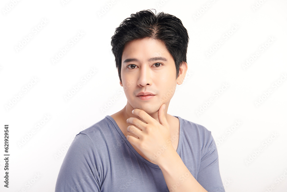 handsome young asian man on white background, Face care, Facial treatment, Cosmetology, beauty and spa, Asian men portrait. handsome young asian man on white background, Face care, Facial treatment, Cosmetology, beauty and spa, Asian men portrait.