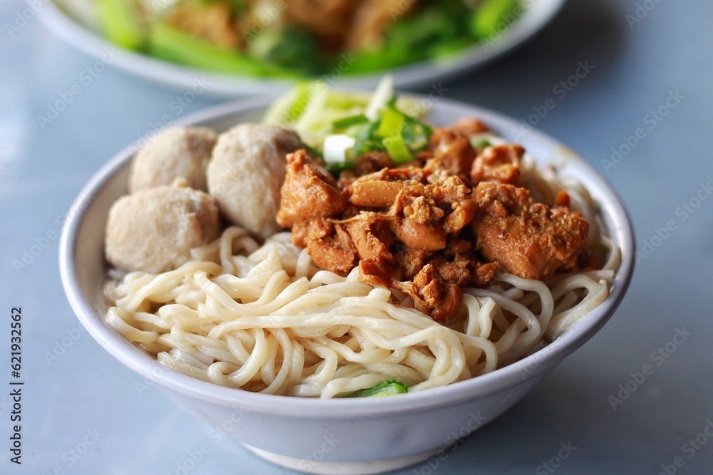 chicken noodle meatball or mie ayam bakso. popular street food in Indonesia