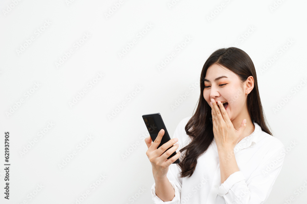 Model asian woman emotion happy and excited to win prizes with online lottery tickets on their mobile phones. Model asian woman emotion happy and excited to win prizes with online lottery tickets on their mobile phones.