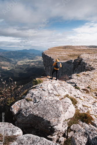mountaineer enjoying the spectacular views of the ayala valley from the mountain range of Gorobel or Sierra Salbada photo
