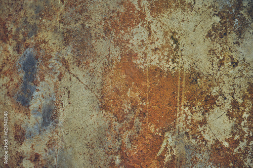 Grey, Abstract background of the shabby concrete wall surface with bright red yellow paint and mossy weathered parts