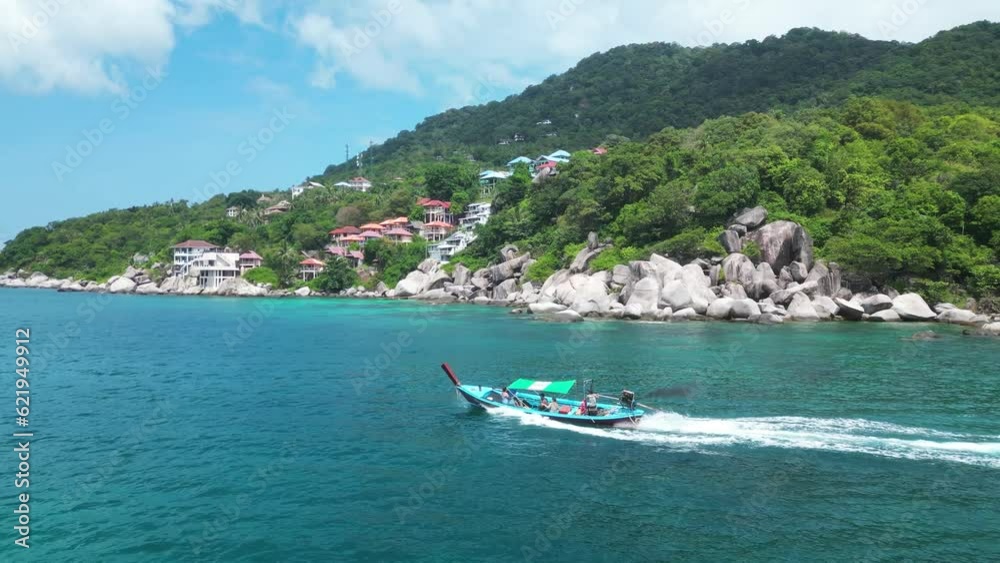 Aerial view of longtail boat on Sairee beach on Ko Tao island, Thailand.