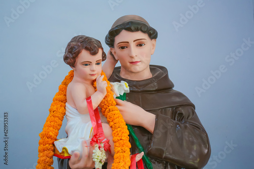 Saint Anthony holding Child Jesus Catholic religious statue photo