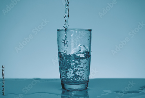 fresh water being poured into glass