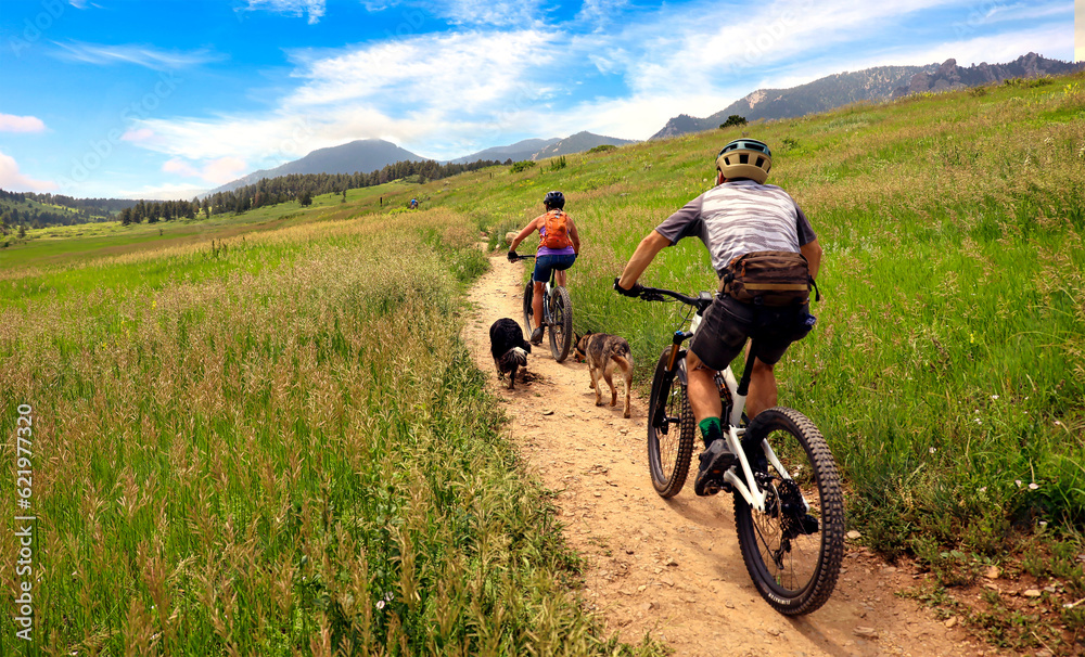 Mountain bikers and dogs on Boulder, Colorado's Doudy Draw Trail