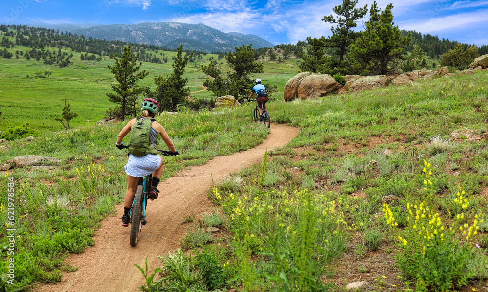 Obraz premium Mountain bikers at Boulder County, Colorado's Hall Ranch Open Space