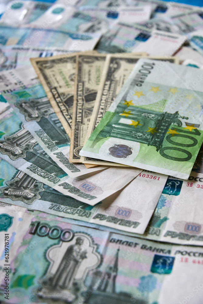 background of paper bills dollars, euros and rubles. Currency exchange rate background of paper bills dollars, euros and rubles. Currency exchange rate